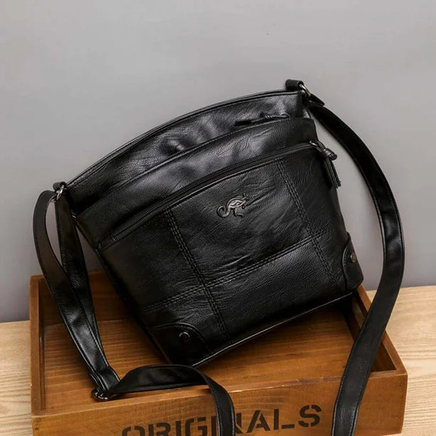 Silvia - Cartera Cruzada Emblema Canguro