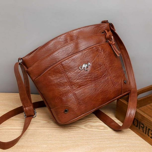 Silvia - Cartera Cruzada Emblema Canguro